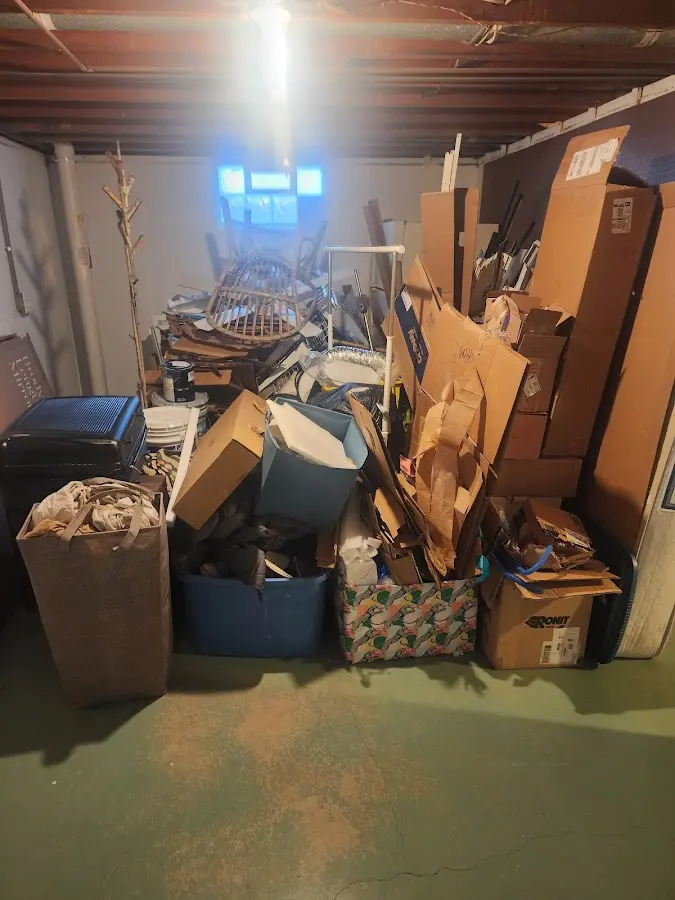 Roll-off dumpster container at job site for Yard Waste Dumpster Rental in Naples